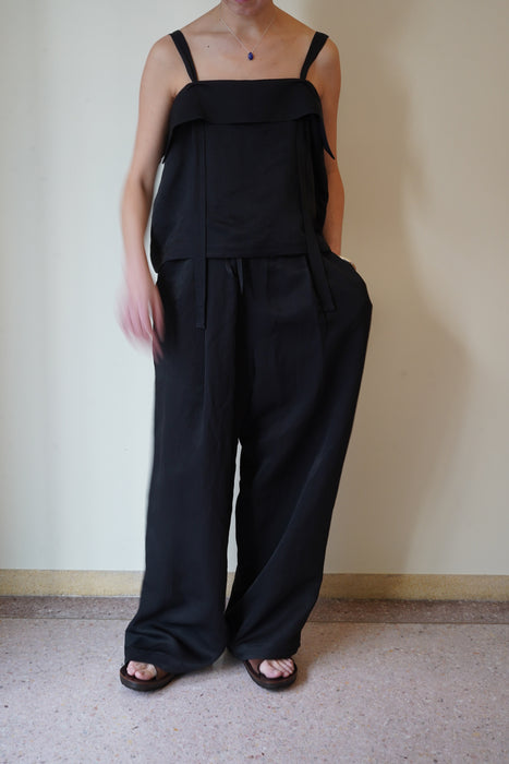 pelleq<br>travel convert bib