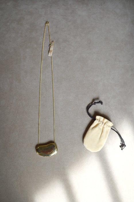HALSTON by ELSA PERETTI <BR>GOLD PERFUME ROCKET PENDANT
