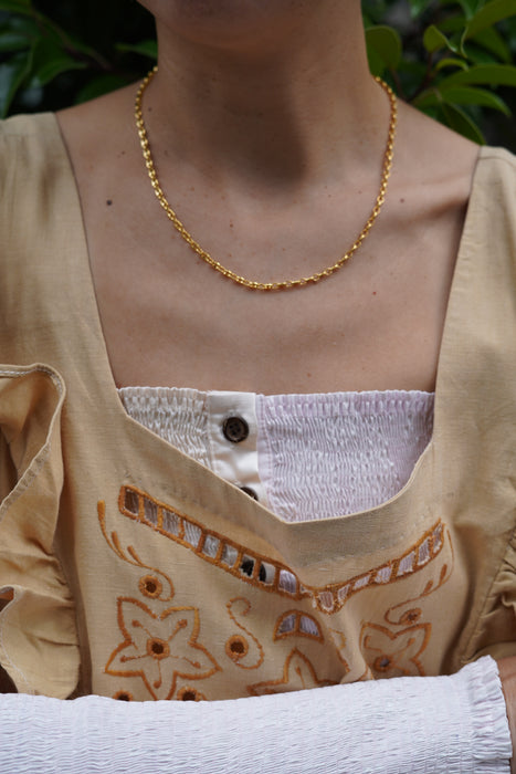 VINTAGE<BR>INDIA IMPORTS<BR>RUFFLE APRON DRESS <BR> <BR>SOLD OUT