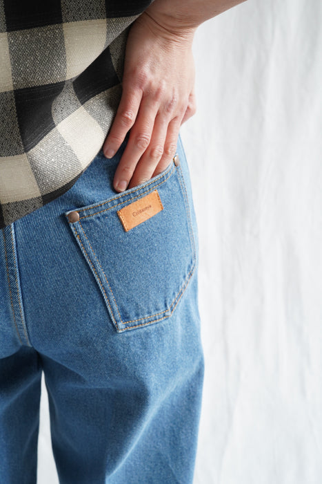 CRISTASEYA<br>BLEACHED DENIM HIGH-WAISTED JEANS