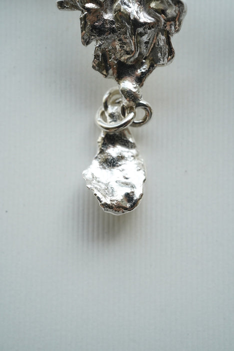 Claudia Lepik<br>ABSTRACT ORCHID EARRINGS WITH MOVING DETAIL