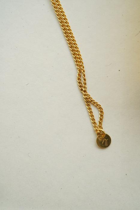 AXEP<br>TAG NECKLACE<br> in GOLD