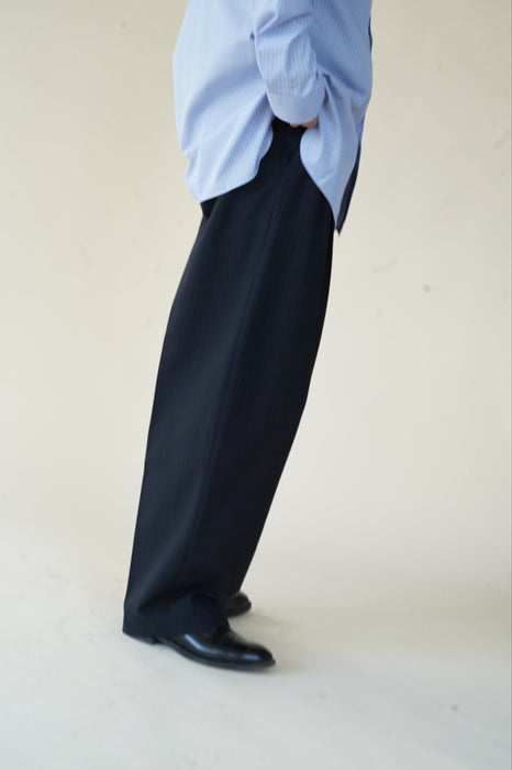CRISTASEYA<br>DOUBLE PLEATED WIDE PANTS<br>in BLACK/NAVY STRIPES
